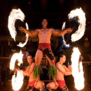 An exciting pyramid of fire dancers creating dramatic rings of fire on the Mai-Kai stage.