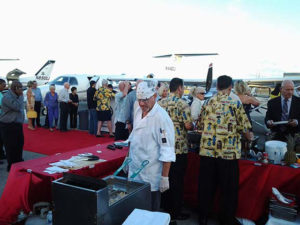 An example of an outdoor serving station for an off-site airplane themed banquet catered by the Mai-Kai.