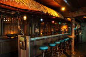 The beloved bar of the Molokai featuring ship artifacts and also lamp shades freely decorated by Mai-Kai patrons over the years.