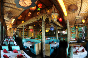 Wide view of the secluded Tahiti dining room.