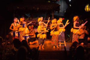Young Polynesian dancers performing the Mai-Kai's children's show in color traditional garb.