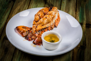 Lobster tail served with drawn butter.