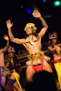 Close up of male Polynesian dancer on Mai-Kai’s stage.