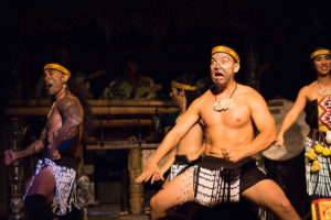Close up of male dancers performing during the Maori number.