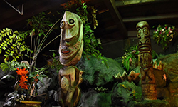 Iconic hand carved tiki sculptures featured in the indoor Mai-Kai gardens.