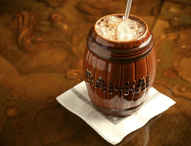 The famous Mai-Kai Barrel O'Rum drink served in its own signature ceramic barrel shaped mug.